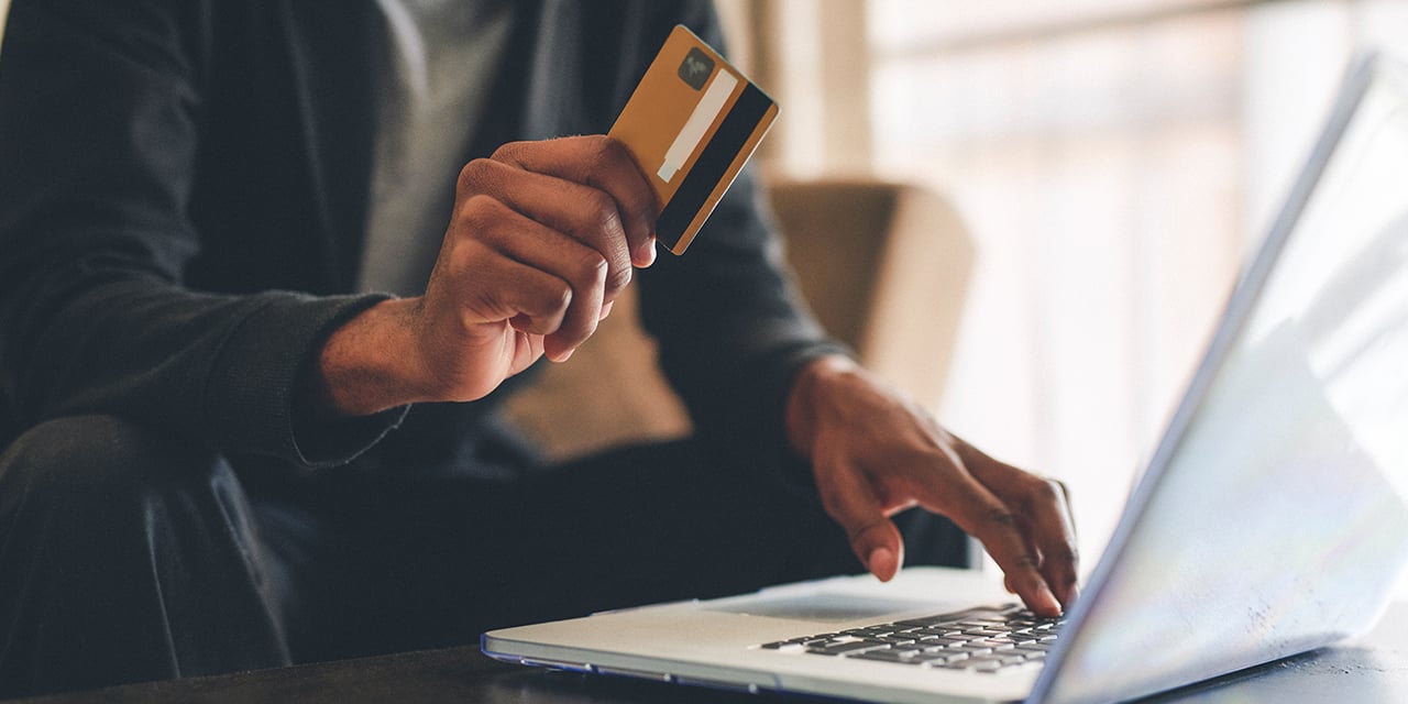 person paying down credit card debt